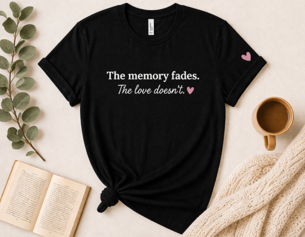 The Memory Fades. The Love Doesn’t. Caregiver T-Shirt